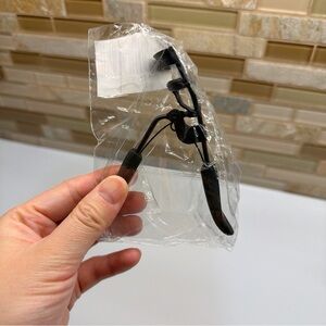 $25/3 clarins eyelash curler